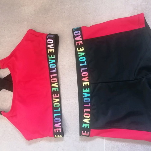 Girls' beach set used, swimsuit with crisscross back and shorts