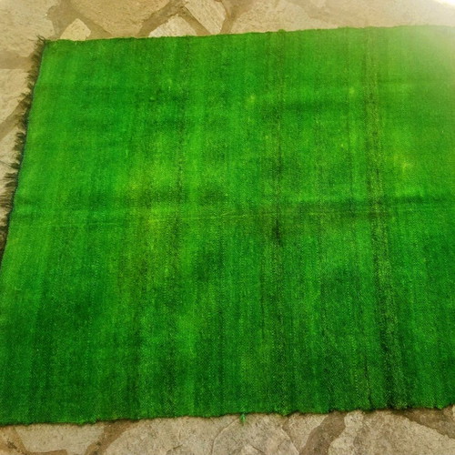 Woven green loom rug like new
