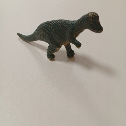 Miniature dinosaur figure like new