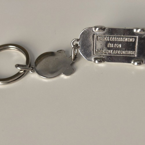 Lumidis Papagalos Collectible Metal Keychain like new
