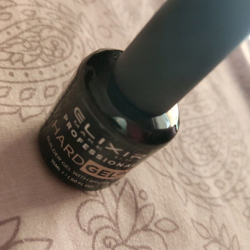Semi-permanent nail polishes new, gel hardener and silver base with rhinestones