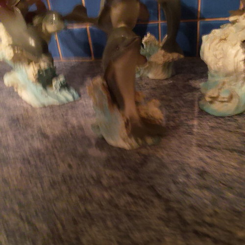 Dolphin Figures used, set of 4 ceramic wave decor