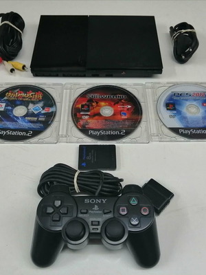 PlayStation 2 Slim SCPH-90004 console used with controller memory card and 3 games