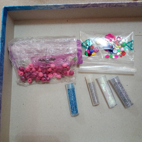 Frozen craft set used, includes beads, rhinestones, and glitter