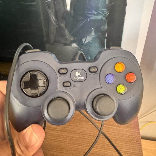 Gaming computer with Samsung Odyssey 30 inch monitor, Razer Kaira headset, Logitech controller