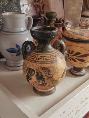 Handmade decorative ceramic amphora vase used