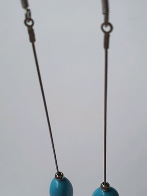 Long dangle earrings with bead