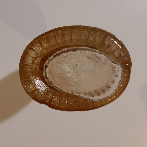 Glass bottle in fish shape used