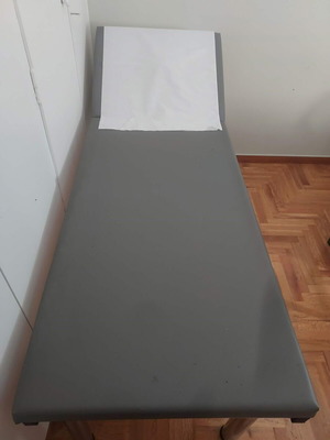 Examination Bed with Stool like new, adjustable backrest
