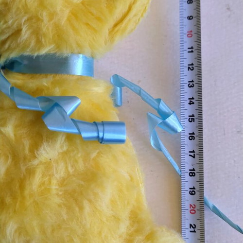 Vintage Greek plush toy, yellow with blue ribbon