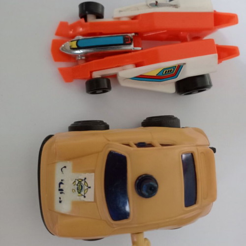 Wind-up police car and racing car used, vintage toys