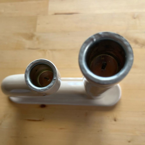 Ceramic candlestick used, two holes