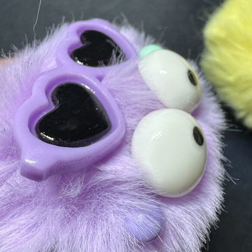 Charms for Crocs like new, pack of 2, purple and yellow furry faces