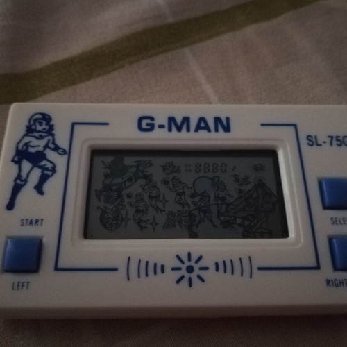 Pocketgame G-MAN SL-75G used electronic game with LCD screen
