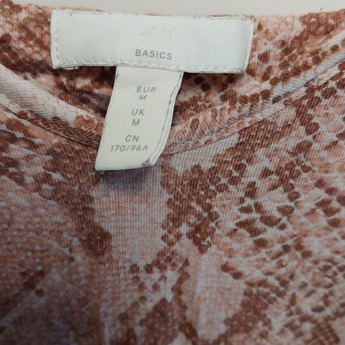 Summer one-piece H&M size M like new with front pockets and waist cord
