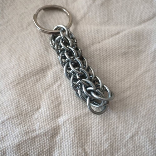 Steel keychain like new, Persian knot