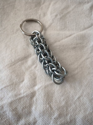 Steel keychain like new, Persian knot