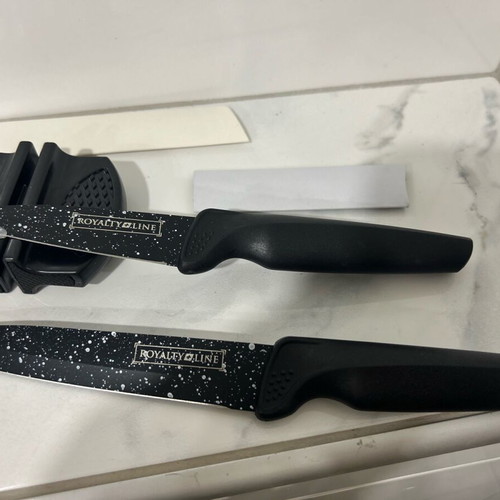 Set of 2 new Swiss knives with sharpener