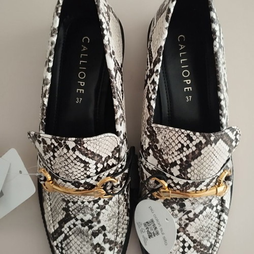 Calliope black and white moccasins new with tag