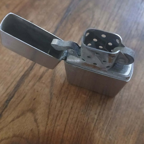 Zippo windproof lighter used with silver metal finish