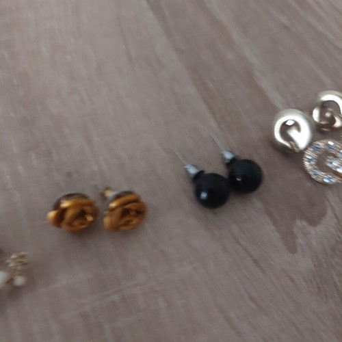 Set of four pairs of earrings like new, black and gold