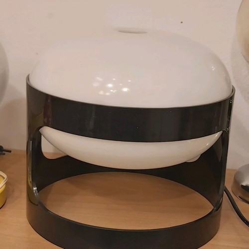 Lamp model KD 27 used, designed by Joe Colombo