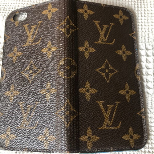 Iphone 6 used unlocked with authentic Louis Vuitton leather case, cable and silicone cover