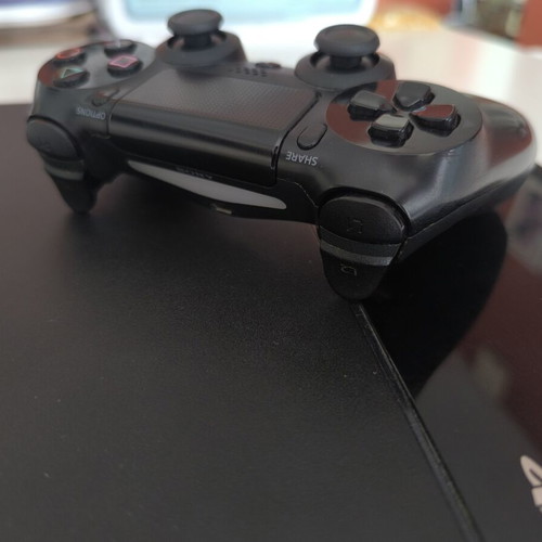 PlayStation 4 500GB console used with DualShock 4 controller