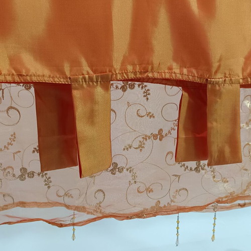 Orange organza curtain like new with beads