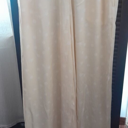 Women's palazzo pants like new, pale yellow with white polka dots