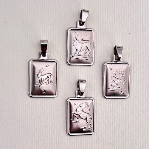 Zodiac white gold k14 pendant like new, platinum plated