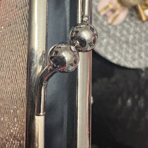 Evening handbag like new in champagne color with chain