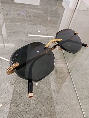 Dilos metal sunglasses with zircon like new, black and gold