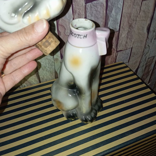 Vintage porcelain bottle shaped like a dog 26"