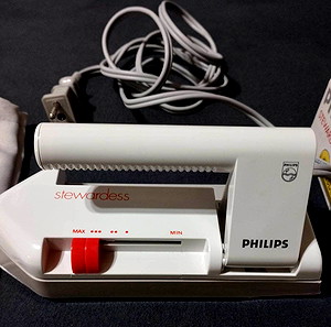 Σίδερο ταξιδίου Philips με πτυσσόμενη χειρολαβή, στο κουτί του.