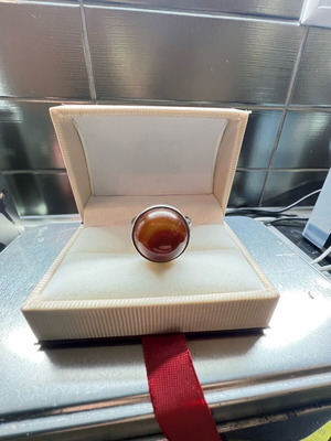 Silver ring like new with round brown stone