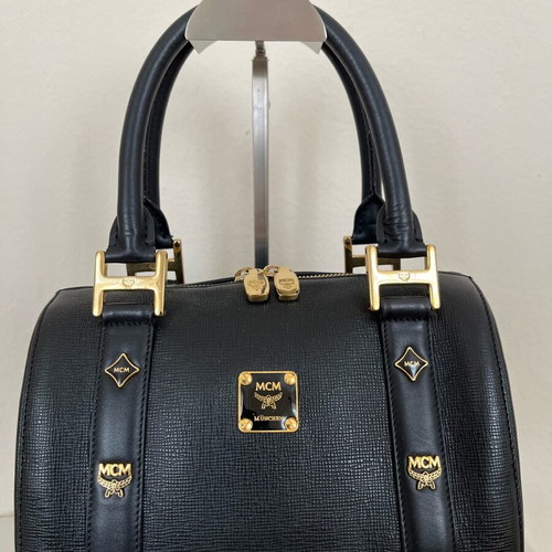 MCM black handbag with gold metal like new