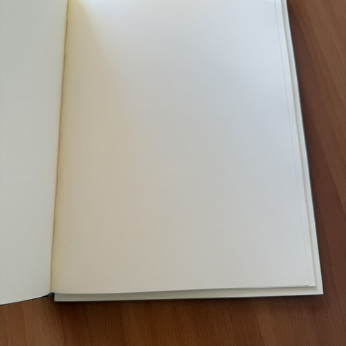 Black sketchbook with fabric cover, 127 sheets