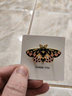 Butterfly pin like new