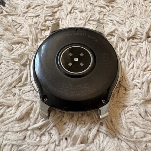 Samsung Galaxy Watch 46mm used with charger and 4 straps
