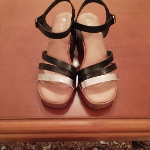 Sandal size 38 black and silver like new with strap and low heel