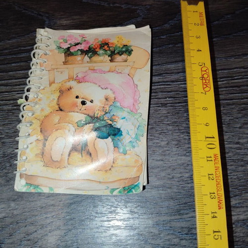 Small notebook used with creases and missing pages