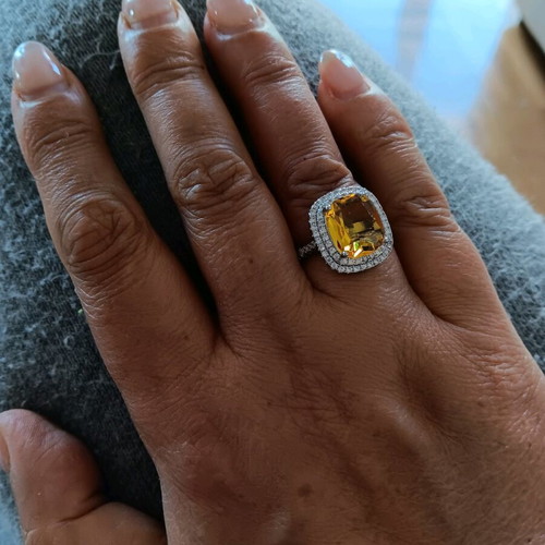 Ring new with large central yellow zircon and white zircons
