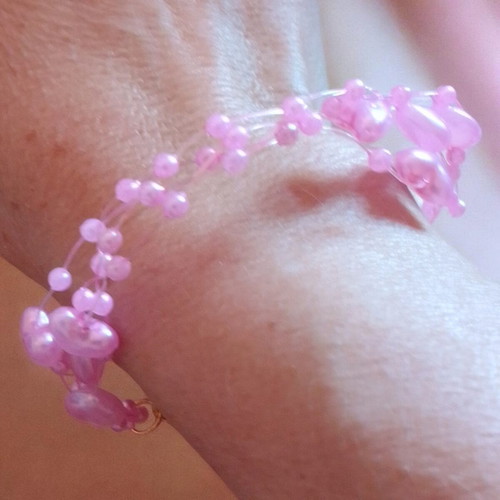 Handmade bracelet with pink hearts and beads, new