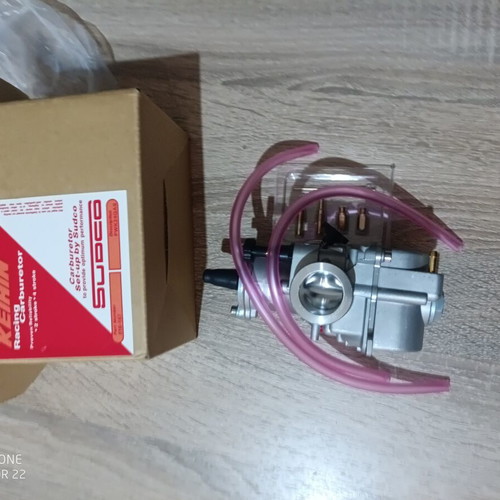 Carburetor 24mm new with extra needle, jet, neck, screws, and rubber mouth
