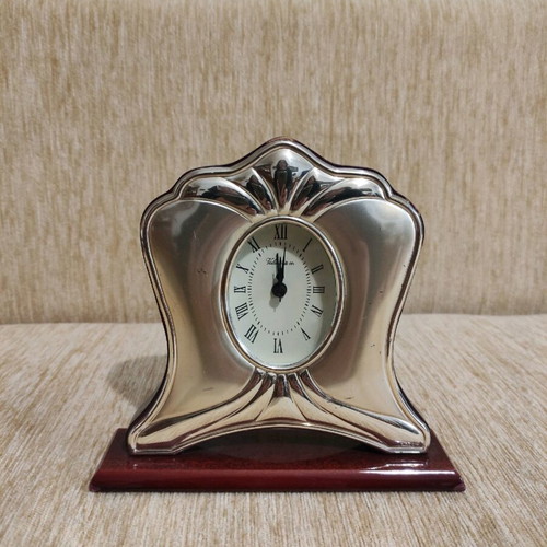 Silver table clock used with rosewood base