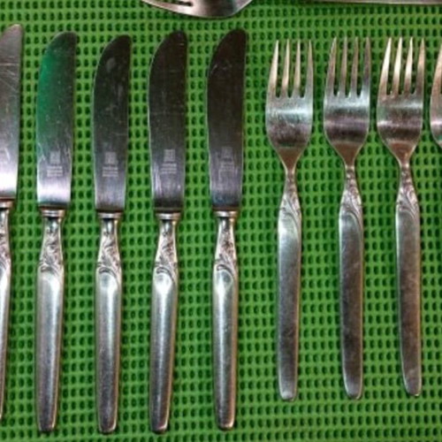 Solingen cutlery set used with 1 ladle, 7 spoons, 7 knives, 8 forks and 4 small spoons