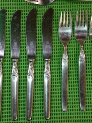 Solingen cutlery set used with 1 ladle, 7 spoons, 7 knives, 8 forks and 4 small spoons