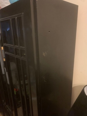 Solid wood showcase used, black lacquer with lighting