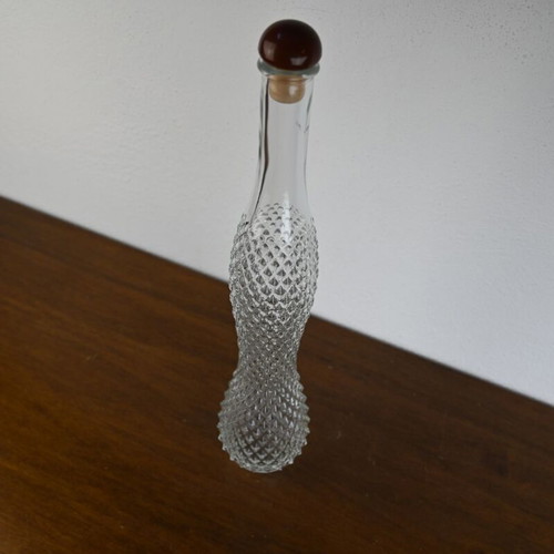 Glass decorative carafe with cork stopper and engraved design like new